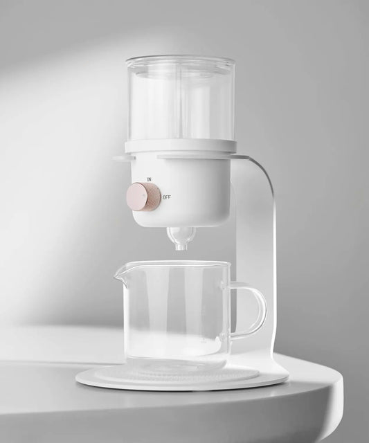 Glass teapot with a strainer